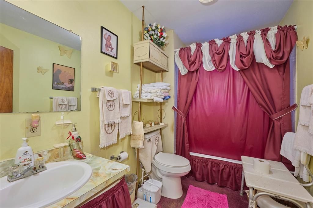 Guest bath is located in the hallway