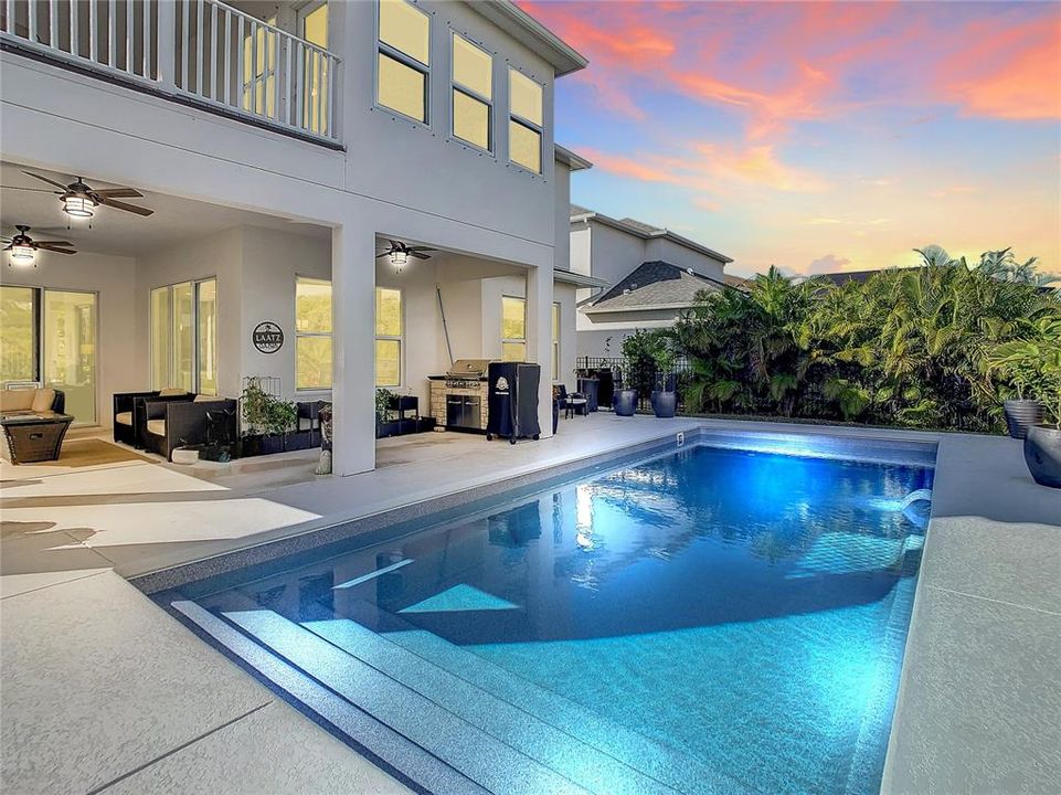 With Stunning Outdoor Living and Sparkling Heated Saltwater Pool