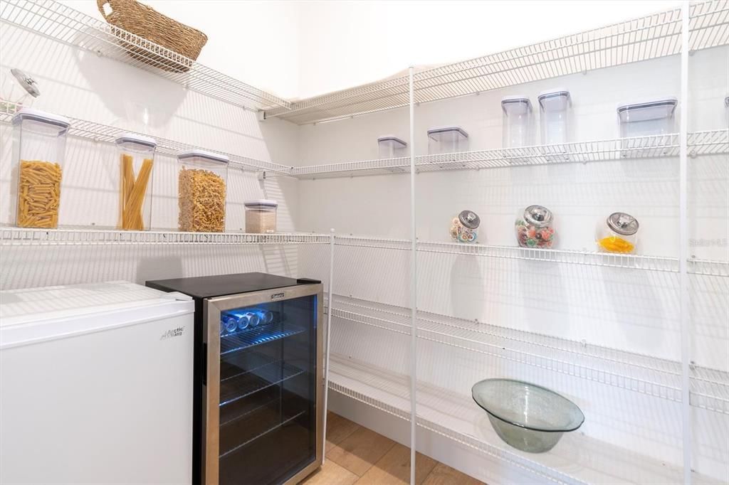 Walk-In Pantry Includes Beverage Refrigerator and Freezer