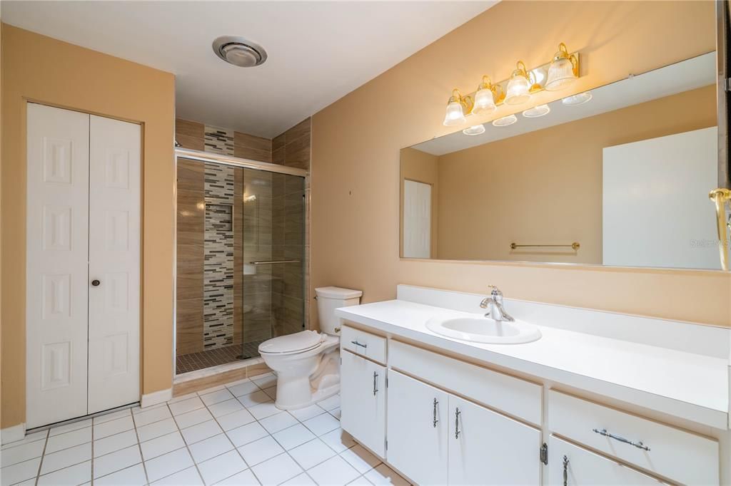 PRIMARY BATH WITH TILE FLOORING