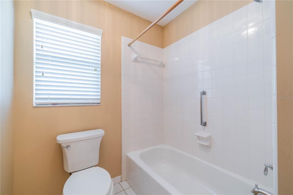 GUEST BATH WITH TUB AND SHOWER