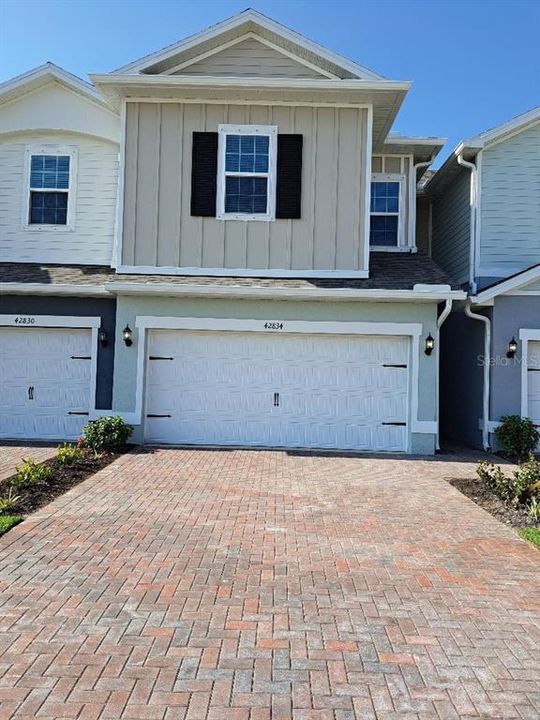 Front of Structure - Be the first to call this fabulous townhome "HOME".