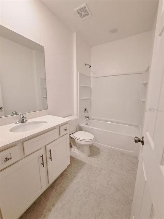 Bathroom - Guest Bathroom with shower and tub combo.