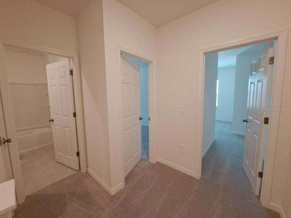 Bedroom - Top of the stairs right side looking at Guest Bath #2 and Bedrooms 2&3.