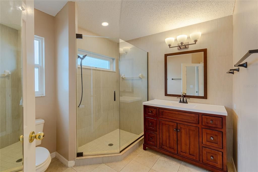 Second guest bedroom's large built-in closet. A fulll bathroom is next door. Linen closet across the hall.