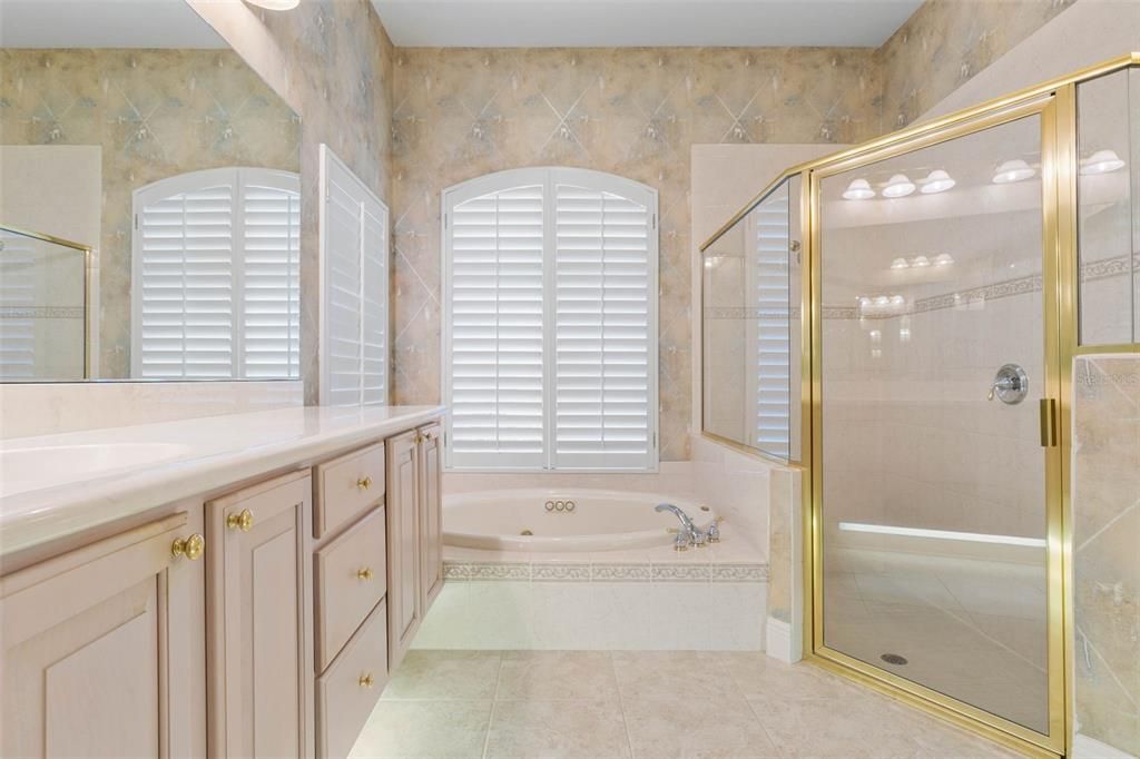 Primary Bathroom With Walk In Shower an Tub