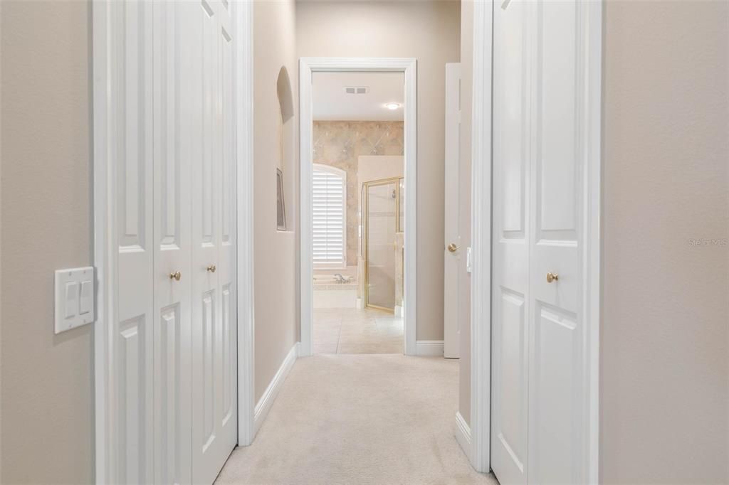 Primary Hallway with 2 Walk In Closets