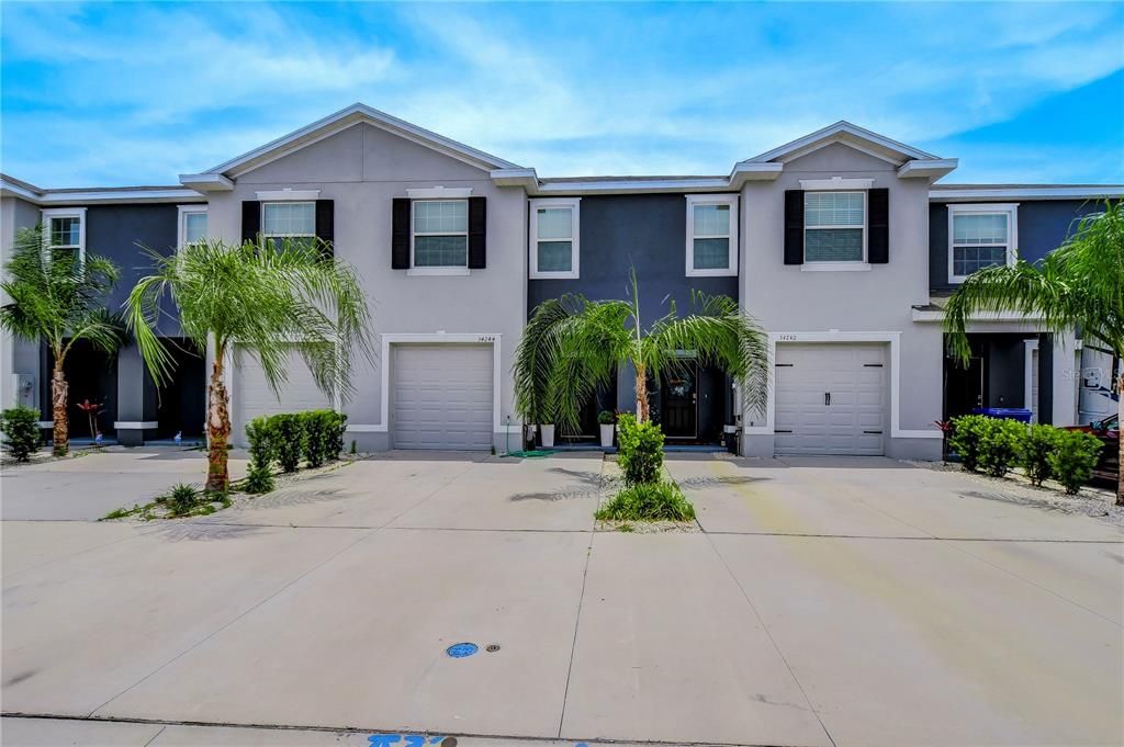 Notice the 1 car garage PLUS a 2 car parking driveway!