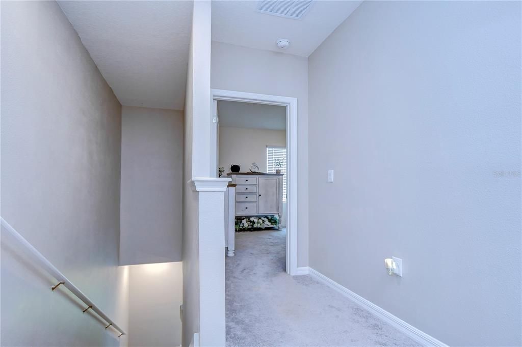 Hall into Primary Bedroom