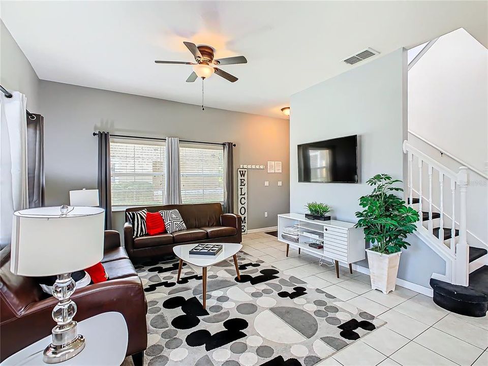 Step into modern comfort and vibrant style with this spacious 4-bedroom townhouse in Kissimmee! Perfect for family gatherings, the open floor plan features a chic living area, contemporary kitchen with quartz countertops, and a view of the private pool. Located just minutes from Disney World and top attractions!