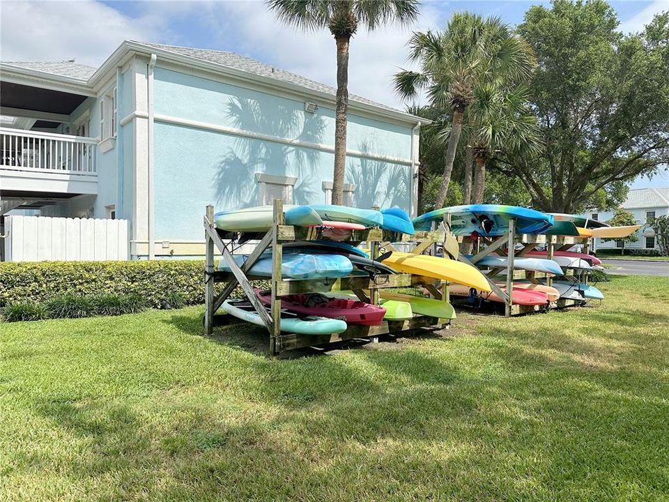 KAYAK RACKS RIGHT AT END OF BUILDING
