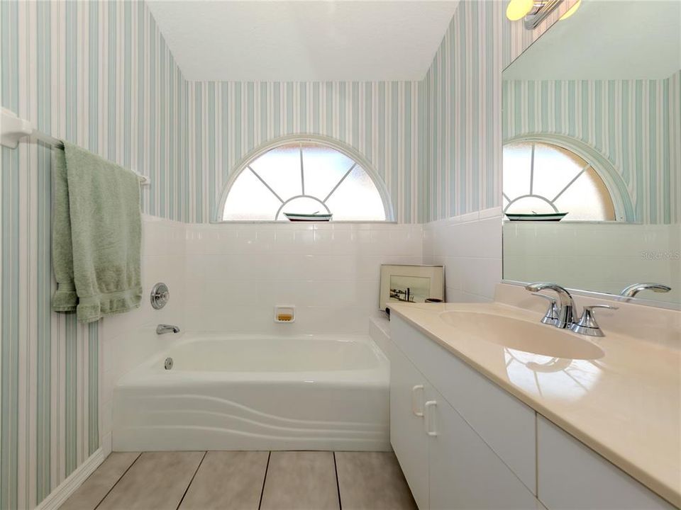 Owner's bath with separate tub