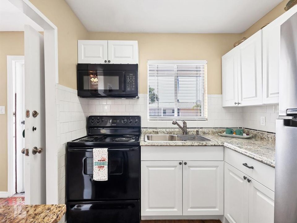 Great kitchen with luxury vinyl plank flooring