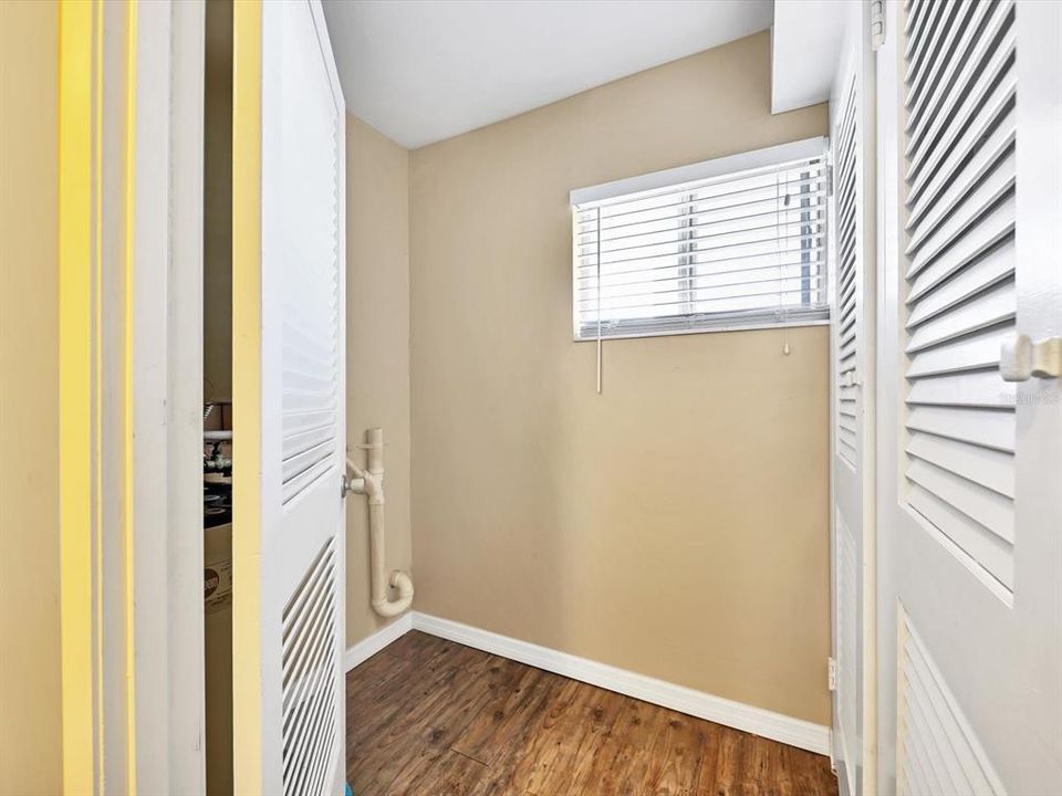 Inside laundry room with washer/dryer hookup