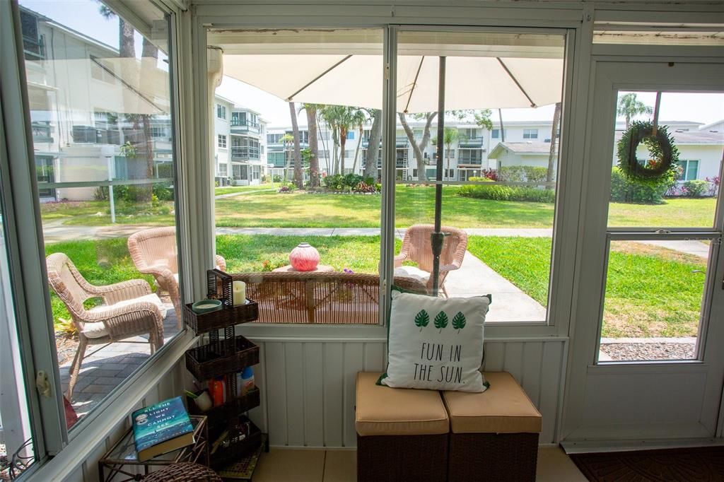 Double pane windows on Lanai with extra sitting space outdoors.