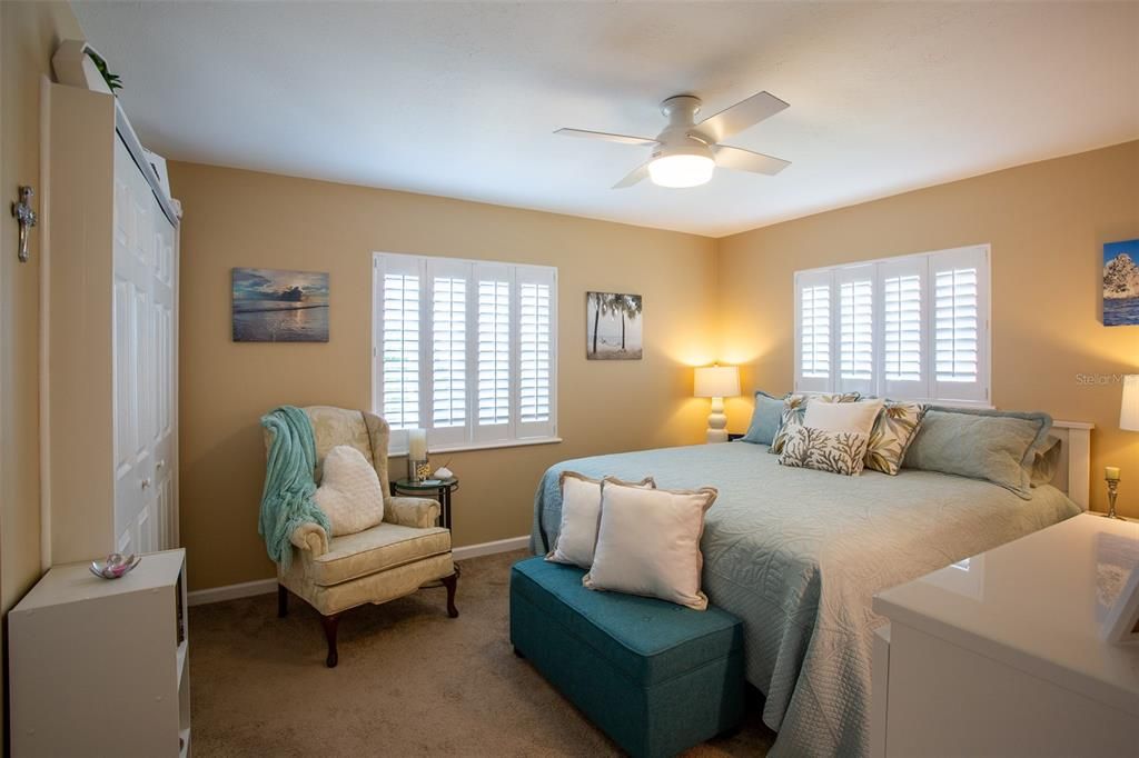 Guest bedroom.  Laundry is in one of the closets here.