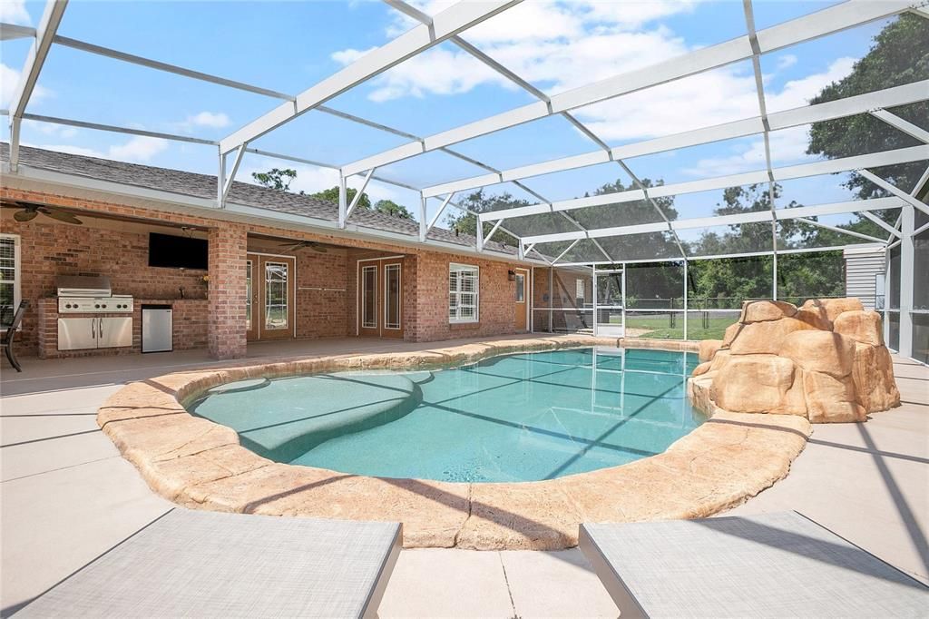 Screened in Gunite Saltwater Pool