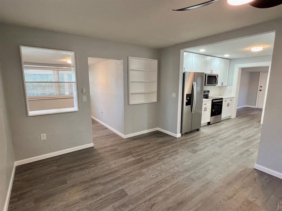 Living room to Foyer and Kitchen
