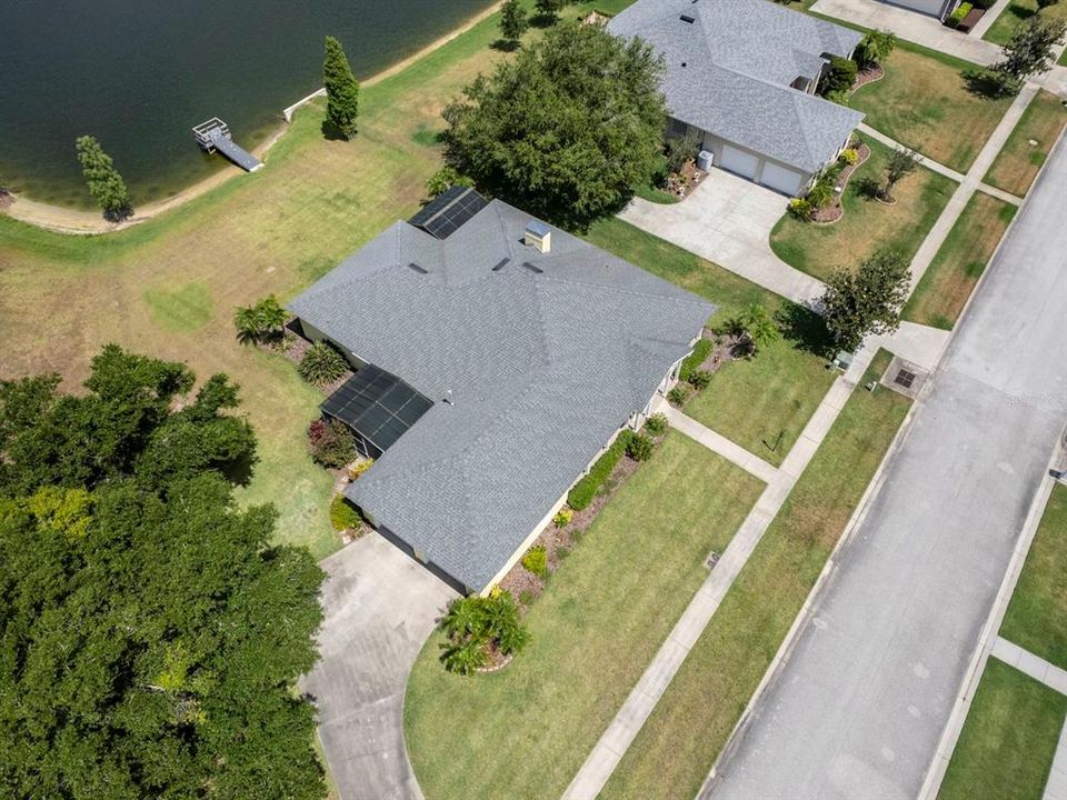 Aerial view of the home and lake.
