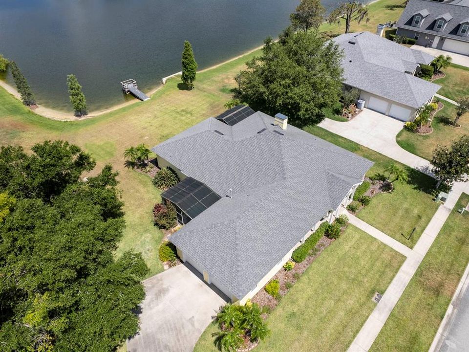 Aerial view of the home and lake.