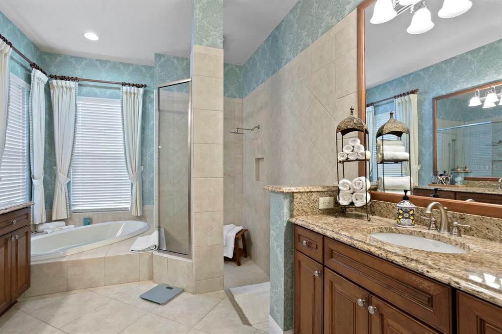Light and bright Primary bath with two vanities and loads of storage.