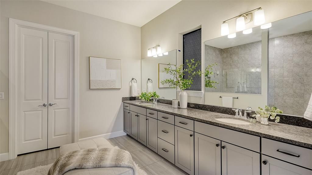 Double vanity and double door entry to dressing room