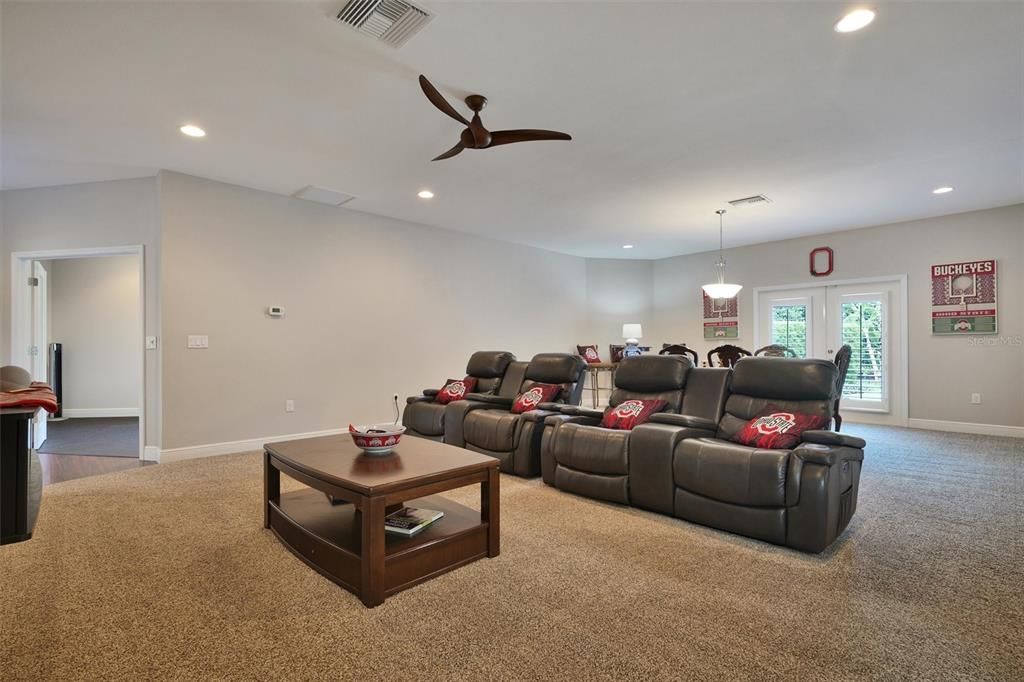 Home theater, game room, could be a play room.