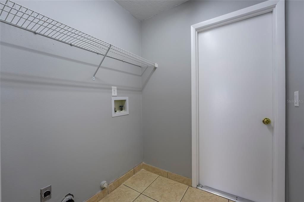 Indoor utility room for washer/dryer.