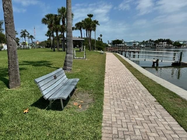 Bayside seating and fishing pier directly across the street from the unit