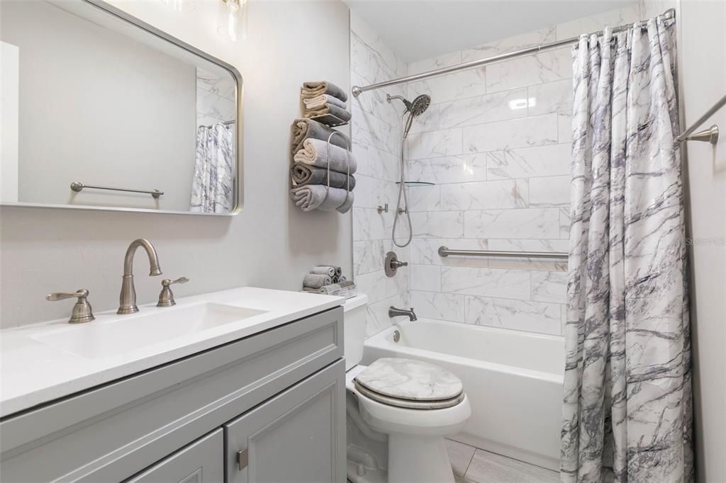 Full Bathroom with Shower/Tub Combo.