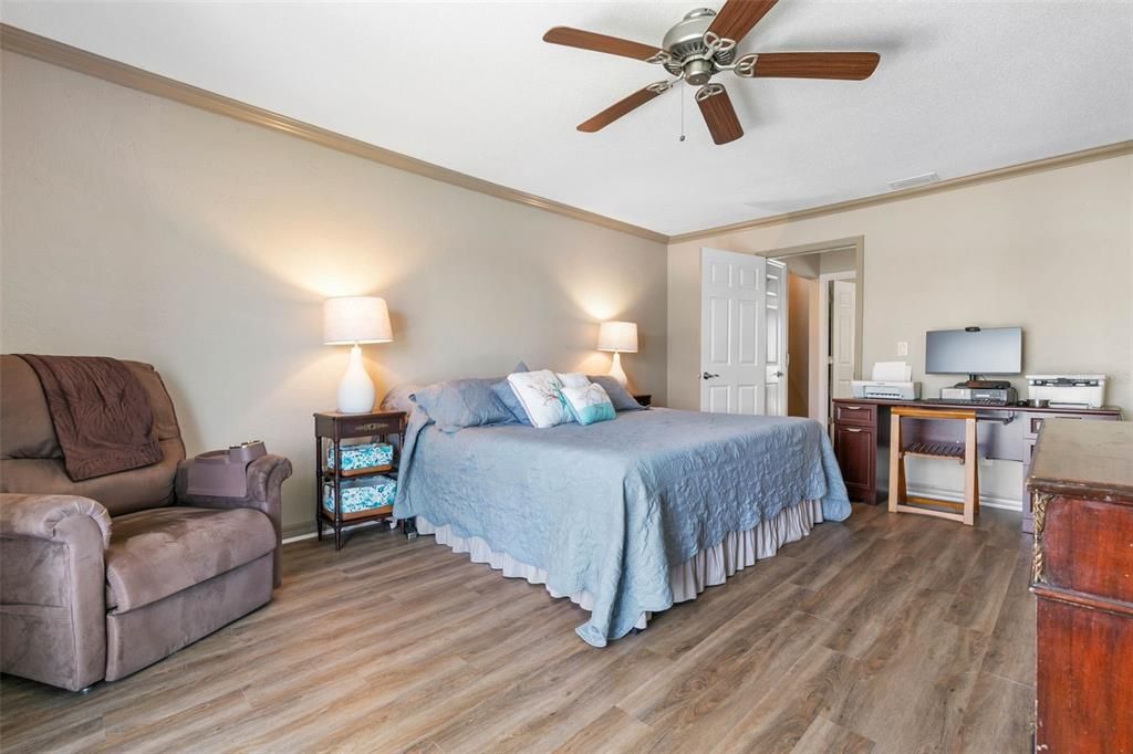 Primary Bedroom with Balcony and Water View.