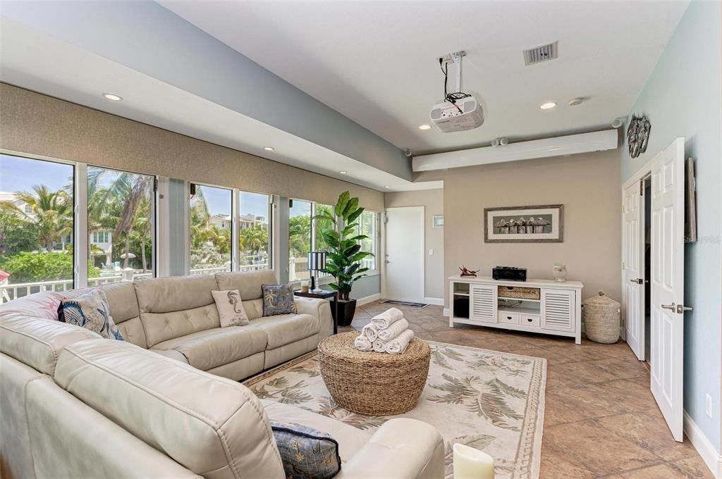 Large living room overlooking the water.