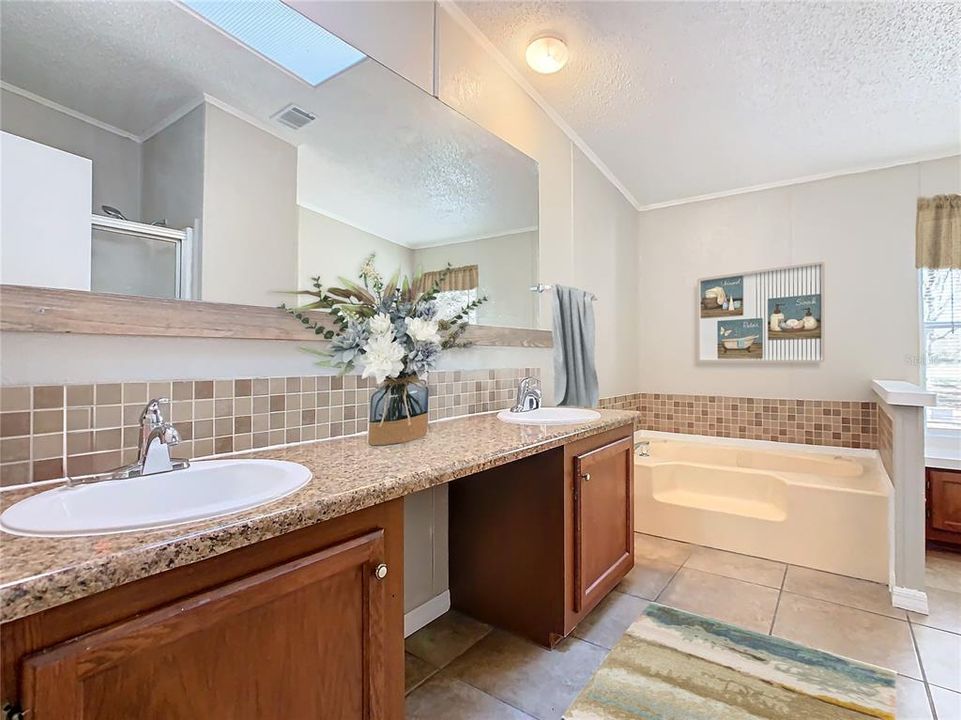 Master Bath double vanity and separate tub and shower