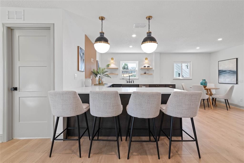 Lower-level kitchen with extra seating