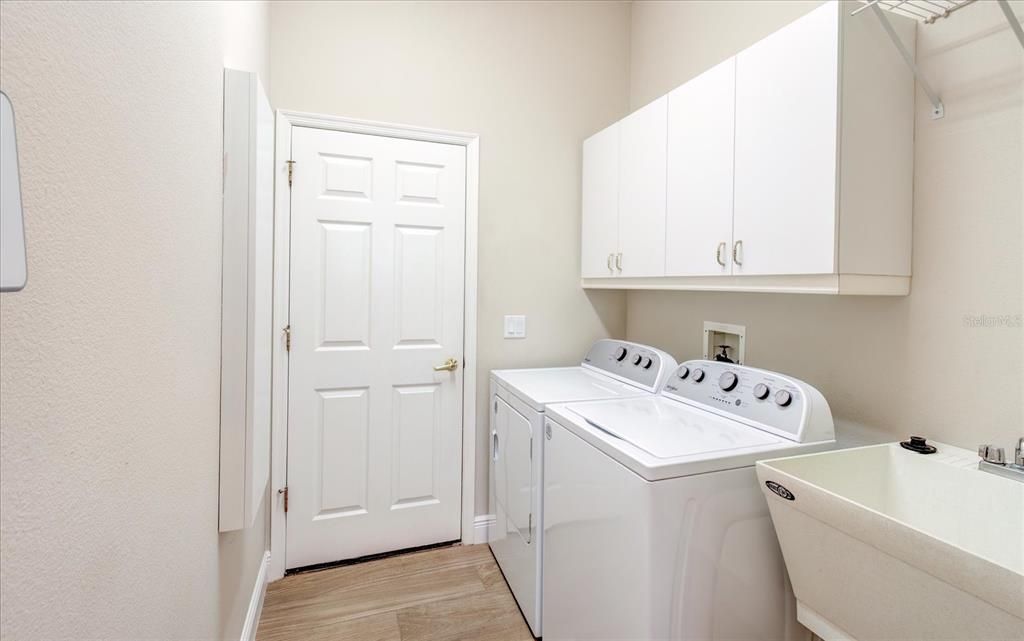 Inside laundry with washer and dryer.