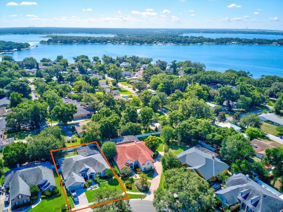 Aerial view of home and neighborhood.