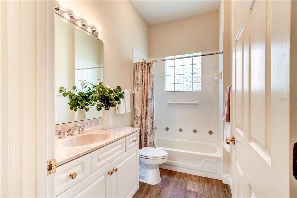 Bathroom 1 on north side of home between bedroom 1 and 2.