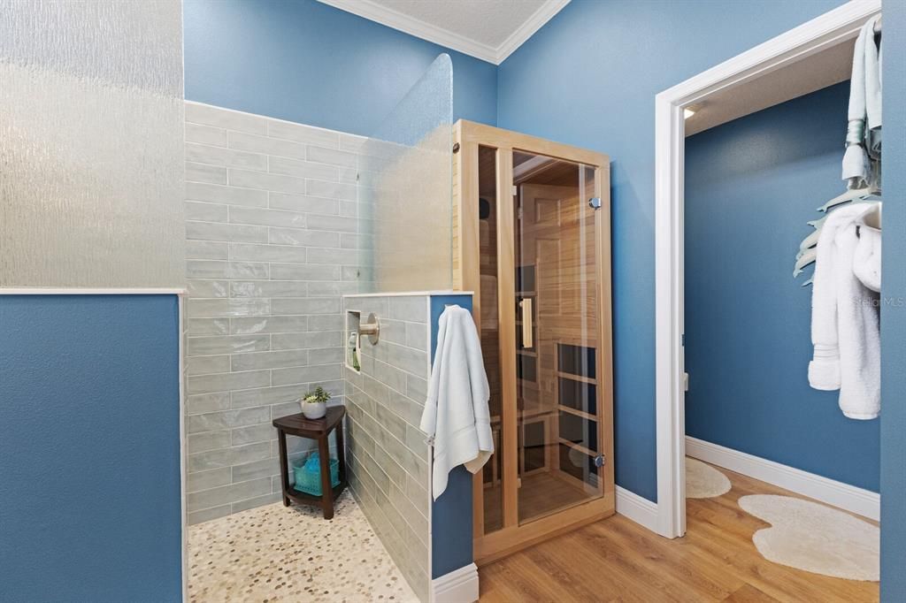 New tiled walk-in shower, sauna and walk-in closet