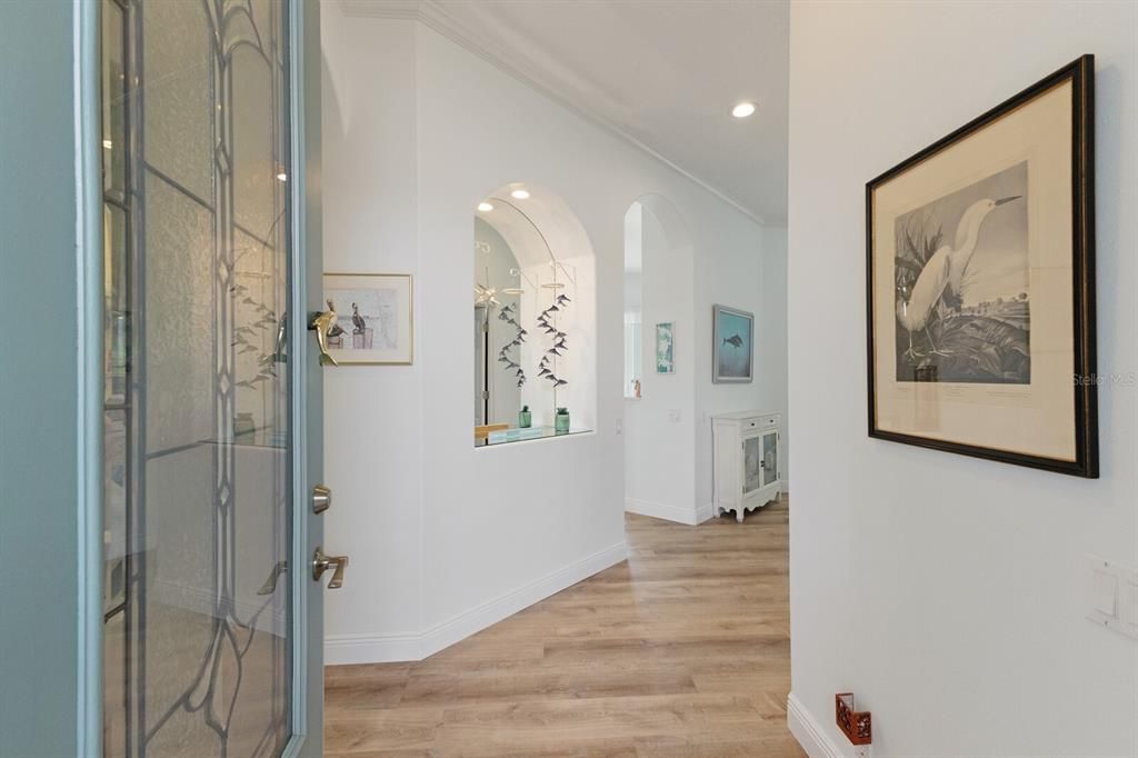 Light and bright interior with crown molding throughout the entire home