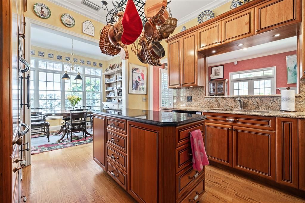 Kitchen opens to breakfast nook and family room