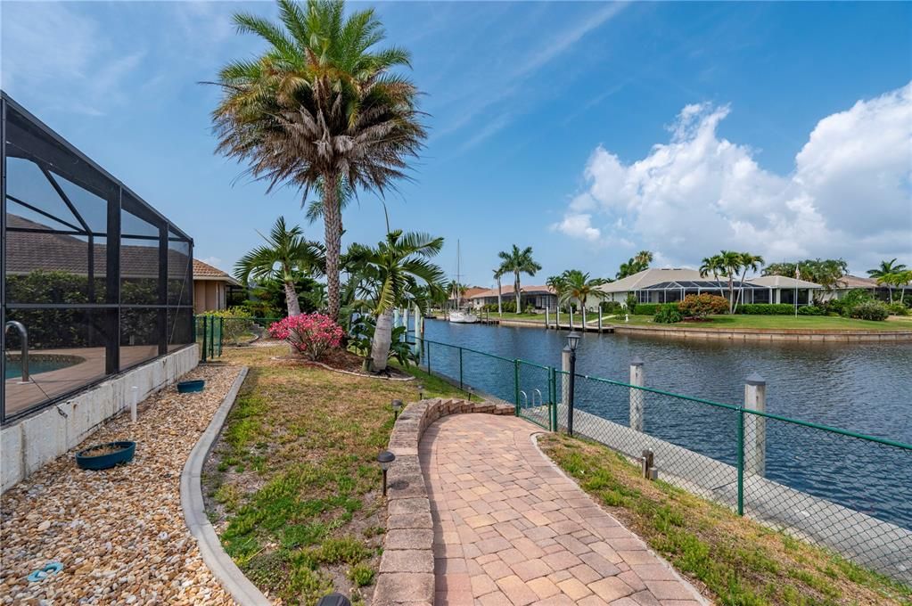 Paver walkway to dock from lanai.