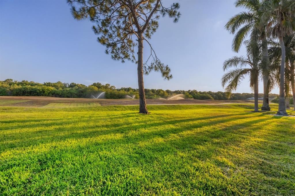 View of golf course fairway from backyard (renovations underway)