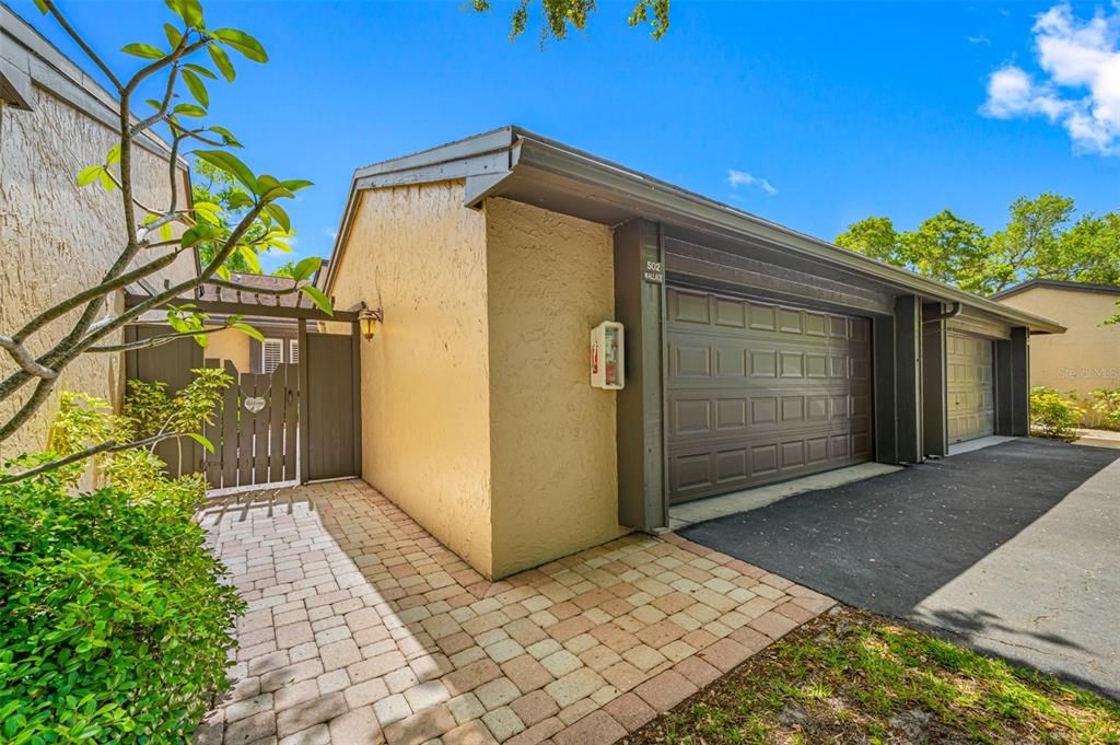 Private Gated Entry with 2 Car Garage & 2 Car Driveway