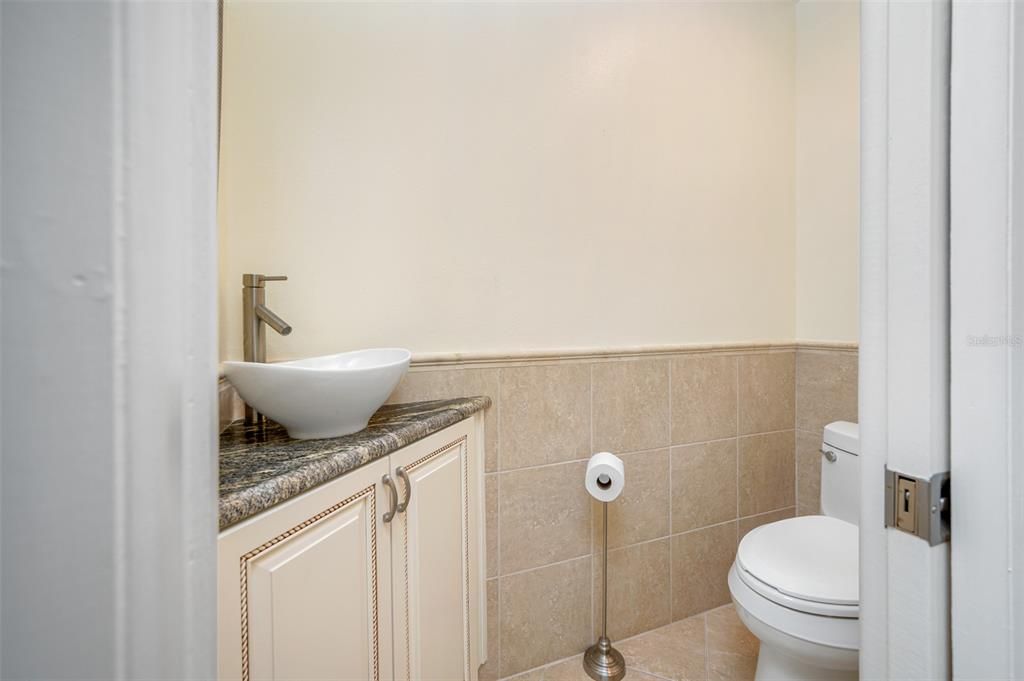 Private commode room in Primary Bath with sink