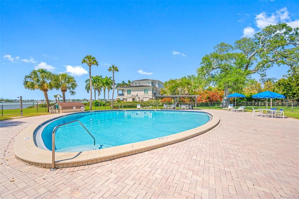Community pool located on the intracoastal fully fenced