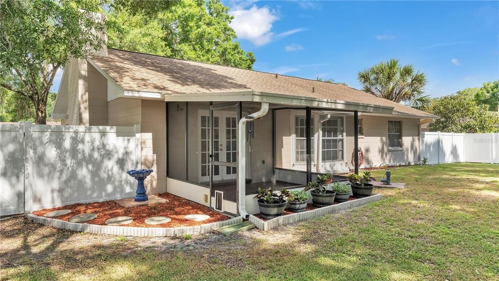 Back Fenced Yard Towards Porch