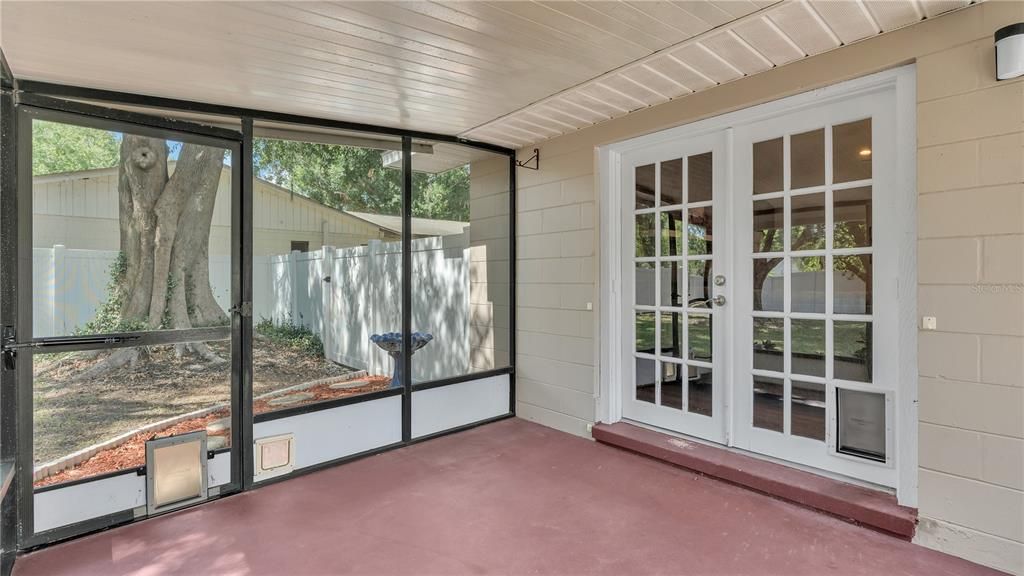 Screened in Back Porch Towards French Doors to Enter House