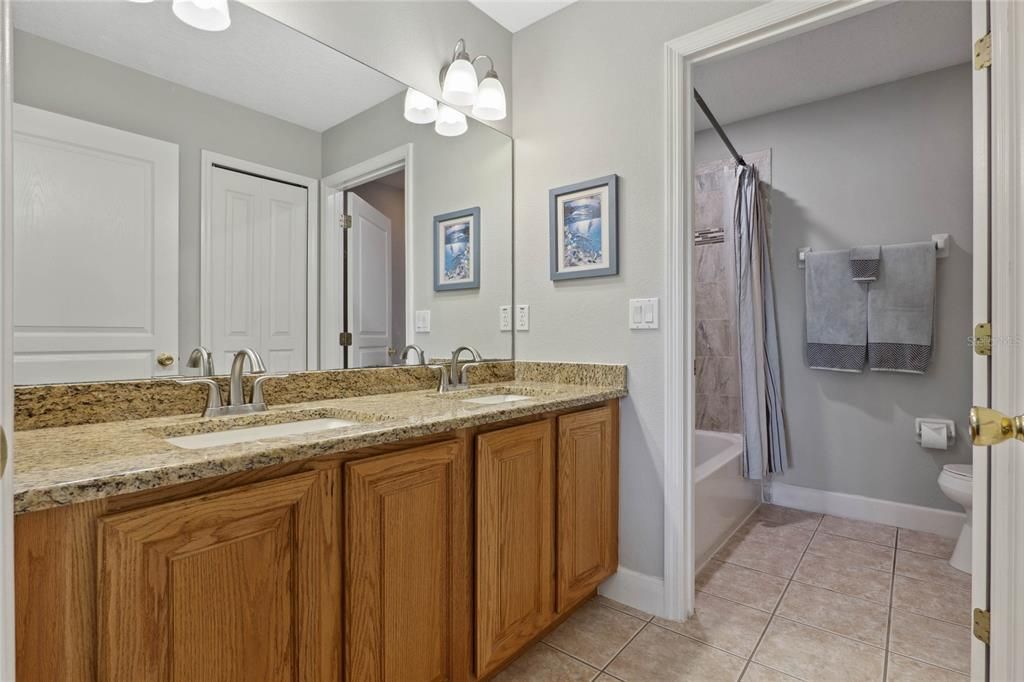 upstairs bathroom, dual sinks, tub with shower