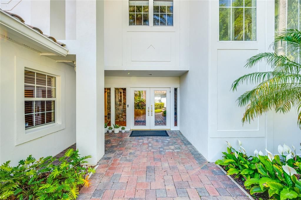 Front Entrance.  Attached 2 car garage to left