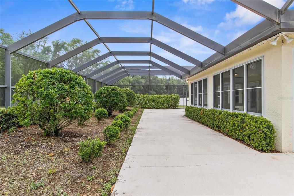 Landscaped Screened in Patio